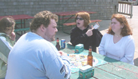 Aimee, Jacob, Kristi, and Carissa playing Trivial Pursuit