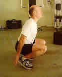 Hindu squat at the bottom on toes