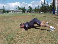 Dive bomber pushup lowering the nose